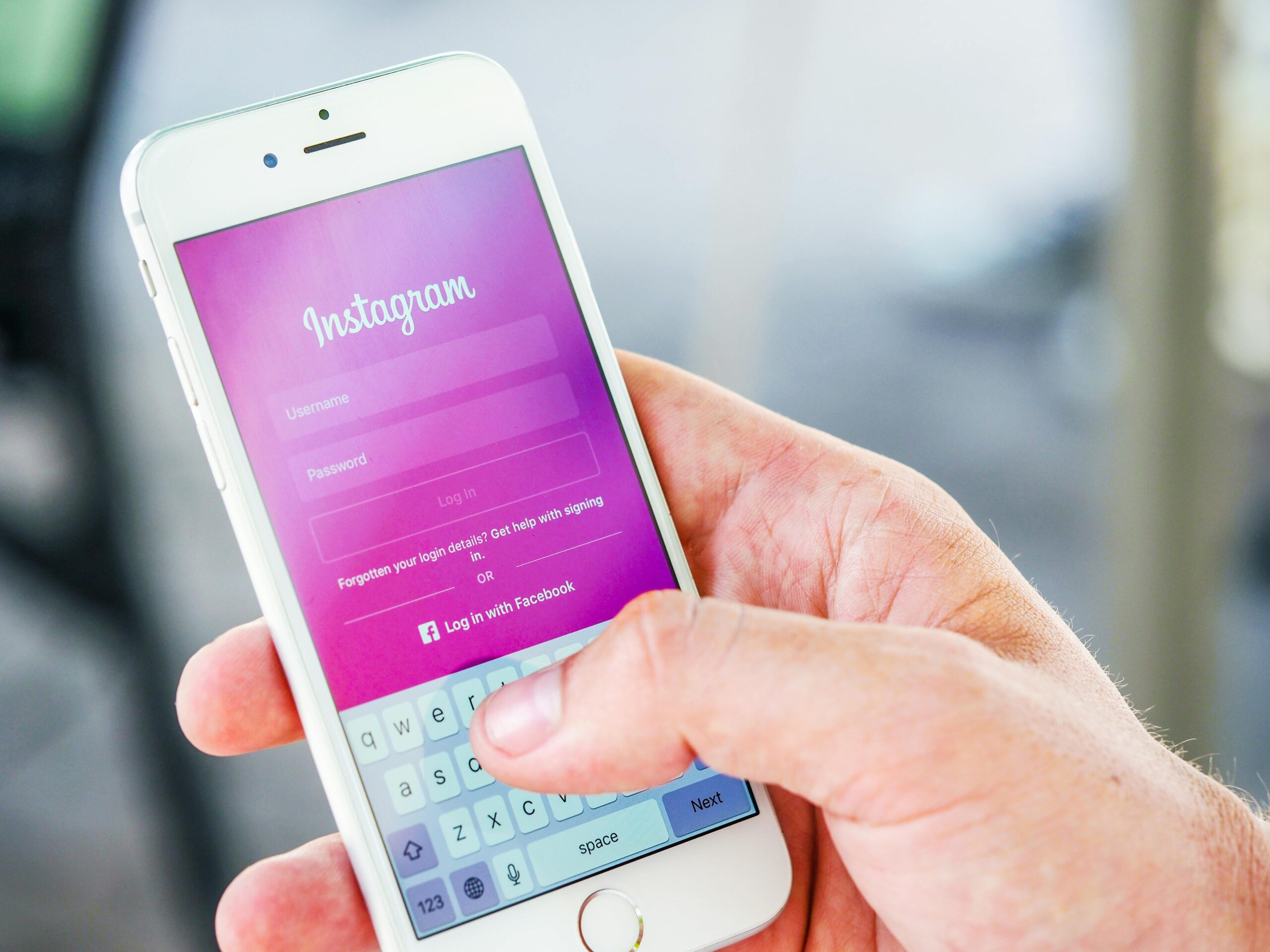 instagram login screen on a white phone